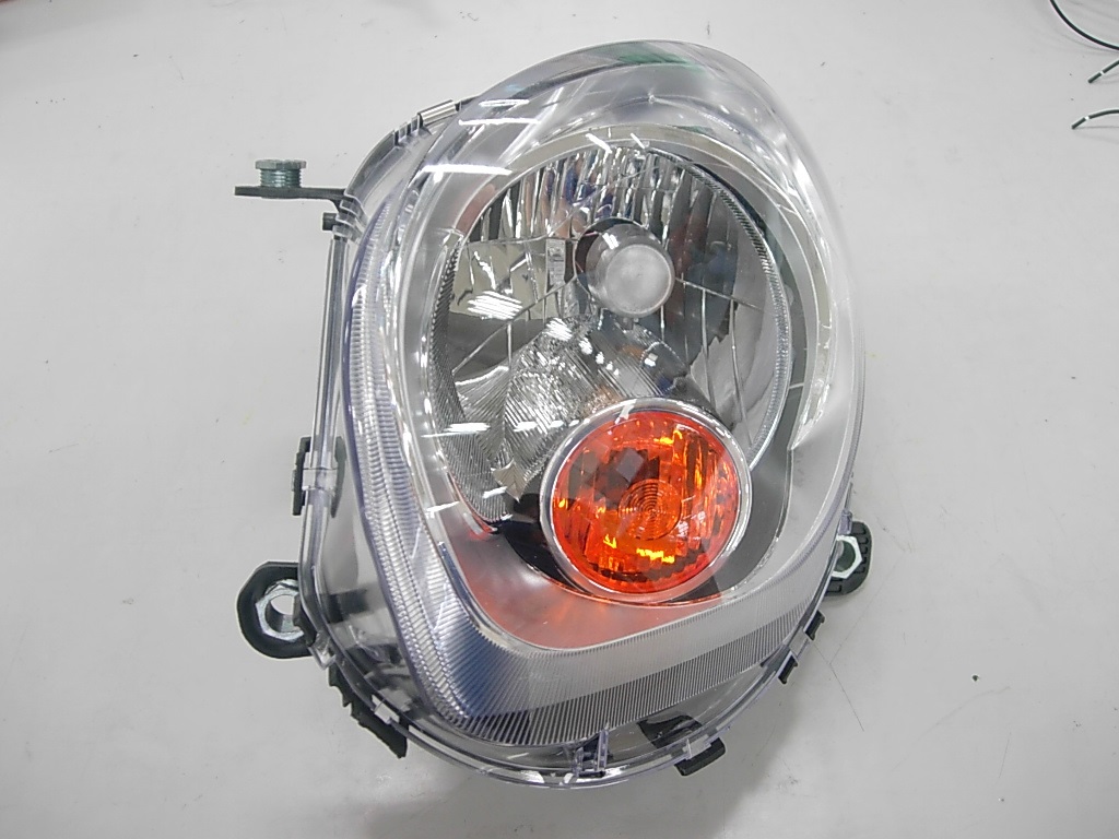 FARO H4 IZQUIERDO REGULACION ELECTRICA CON MOTOR PILOTO AMBAR