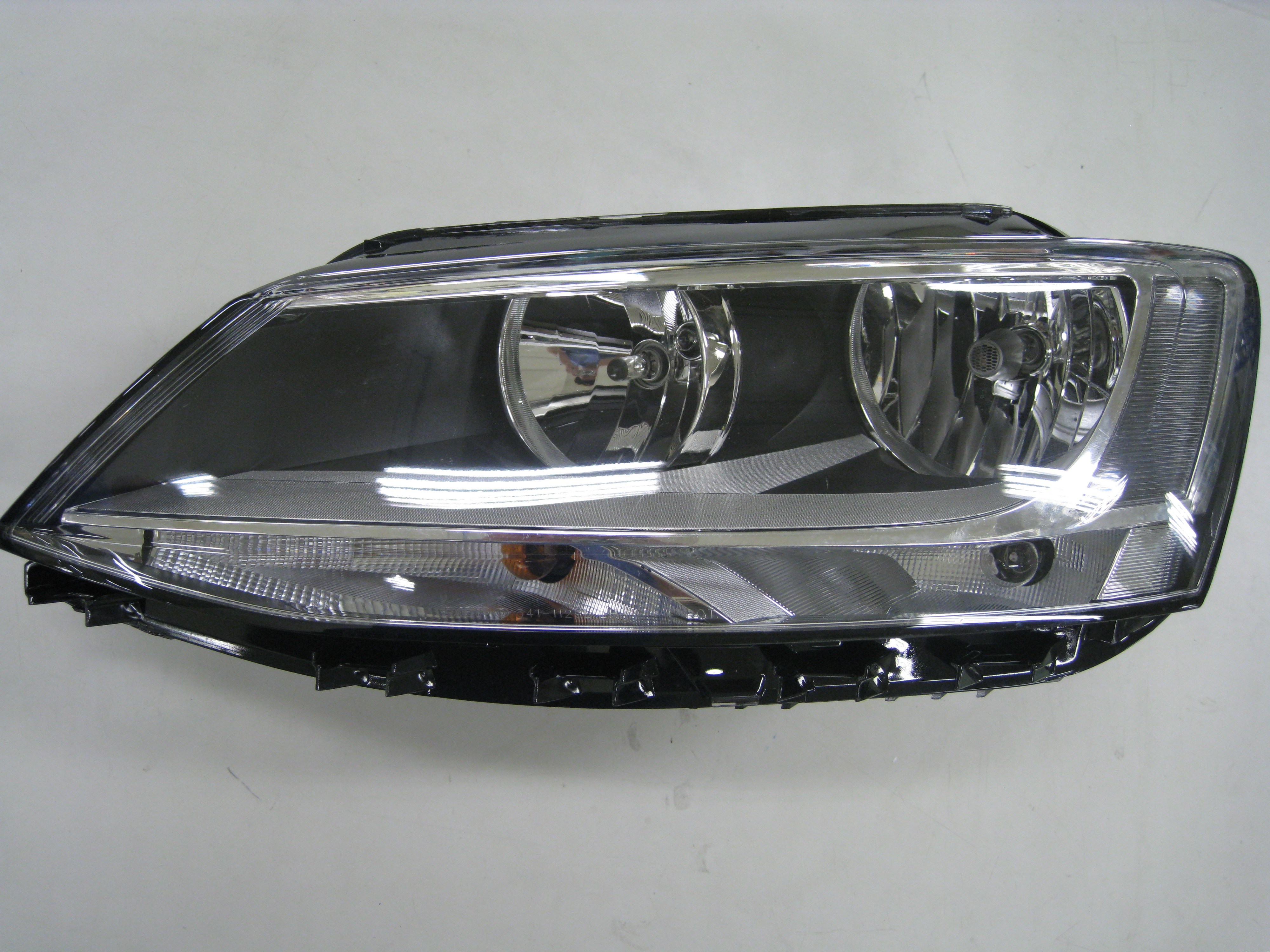 FARO H7 IZQUIERDO REGULACION ELECTRICA CON MOTOR (INTERIOR OSCURO)