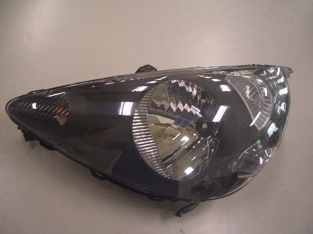 FARO IZQUIERDO ELECTRICA INTERIOR NEGRO (H4)