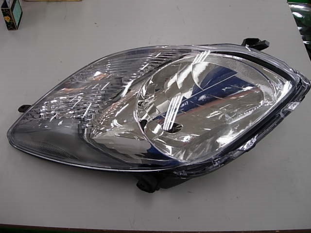 FARO IZQUIERDO CON REGULACION ELECTRICA CON MOTOR (INTERIOR NEGRO) TIPO VALEO